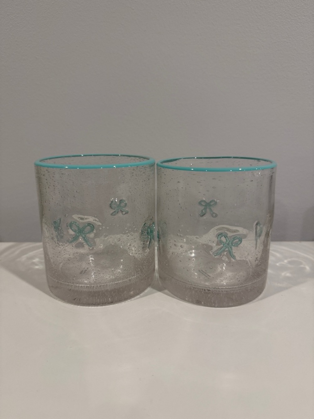 Set of 2 Hand-Blown Clear Glass Tumbler Set with Aqua Trim and Bows